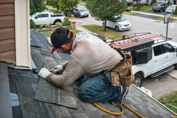 Professional Roof Replacement technician working in Parrish, FL